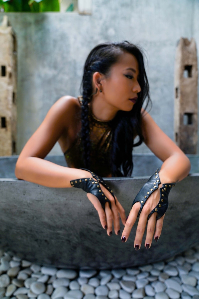 Black fingerless leather gloves by Love Khaos