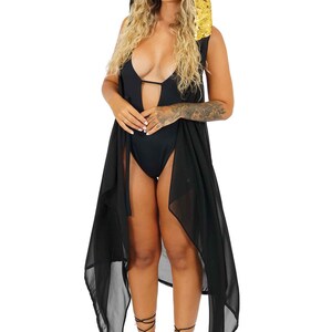 May include: A black sheer cover-up with a gold sequined hood. The cover-up is long and flowing, and the hood is attached to the back of the neck. The cover-up is worn over a black swimsuit.