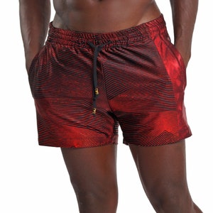 May include: Red and black striped swim trunks with a shiny metallic side panel.