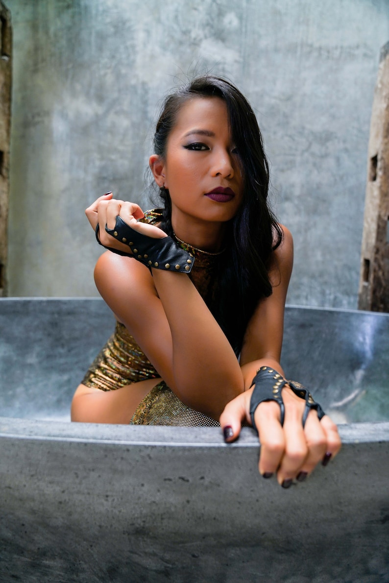 Black fingerless leather gloves by Love Khaos
