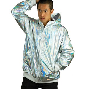 Silver waterproof holographic windbreaker for men. A loose-fit rave jacket with white thumbhole cuffs, full-zip front, and hood by Love Khaos