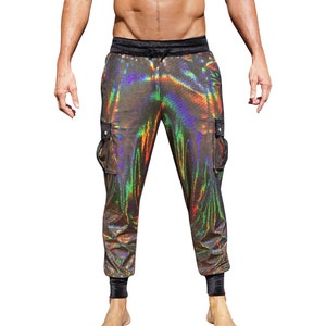 May include: Black and iridescent joggers with a drawstring waist and side pockets. The joggers have a black velvet waistband and black trim at the ankles.