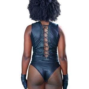 Soft leather bodysuit with mesh side panels and a corset criss-cross back by LoveKhaos