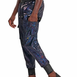 May include: Black cargo pants with a iridescent sheen. The pants have a drawstring waist and multiple pockets.