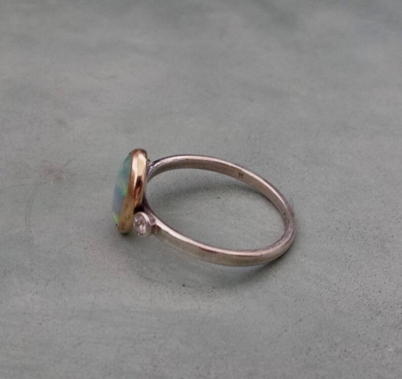 White opal engagement ring,unique alternative engagement ring,9k gold and silver opal ring,white oval opal ring,opal cabochon ring