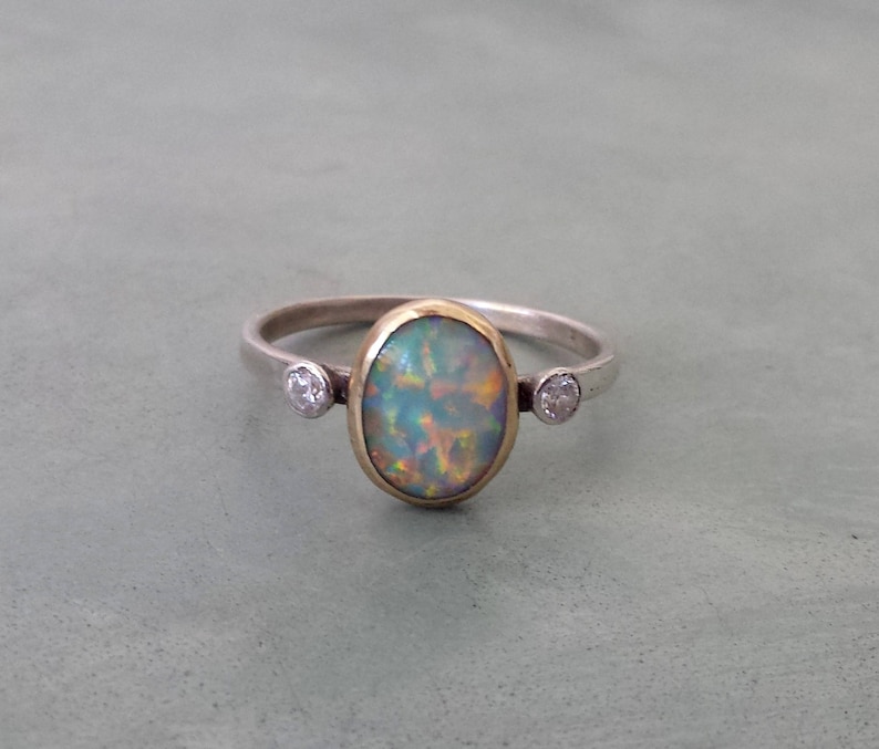 White opal engagement ring,unique alternative engagement ring,9k gold and silver opal ring,white oval opal ring,opal cabochon ring