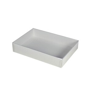 May include: A white rectangular box with a smooth, flat surface. The box is empty and has a slight sheen.