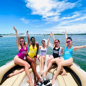 Custom Text Personalized swimwear. Birthday Swimsuit. Beach Party Swimsuit. Honeymoon Swimsuit. One Piece Swimsuit. Bride Squad Swimsuit.