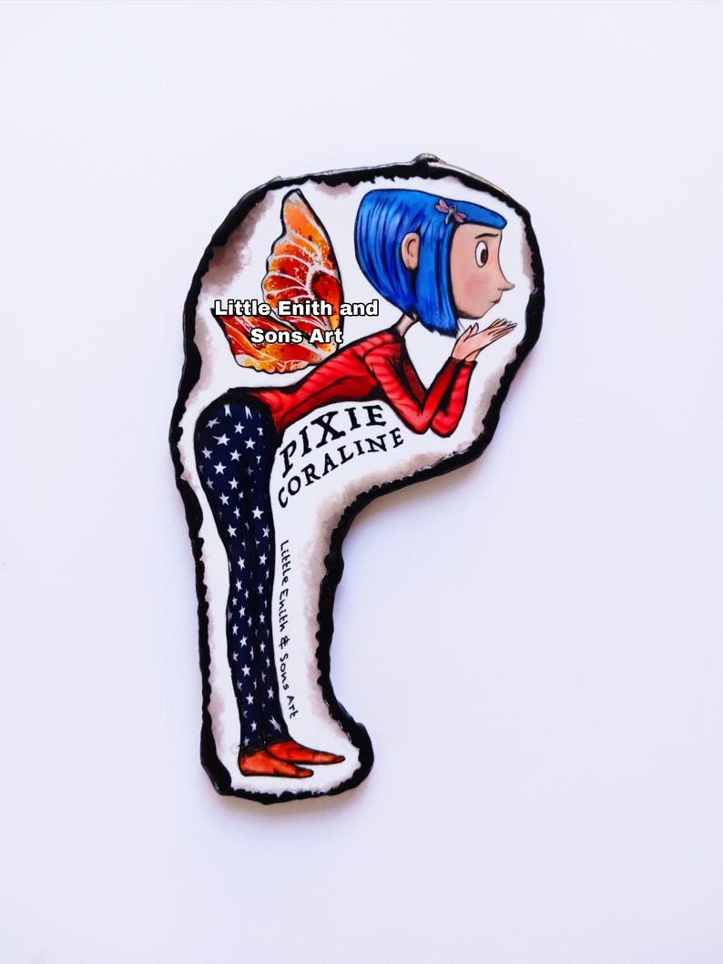 May include: A colorful illustration of a character from the movie Coraline, with blue hair, a red top, and star-spangled pants. The character has orange and red wings and is labeled "Pixie Coraline" with the artist's name.