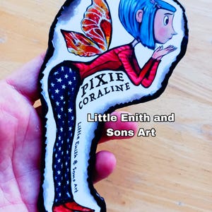 May include: A colorful illustration of a character named "Pixie Coraline" with blue hair, red top, and star-patterned pants. The image includes the text "Little Enith and Sons Art".