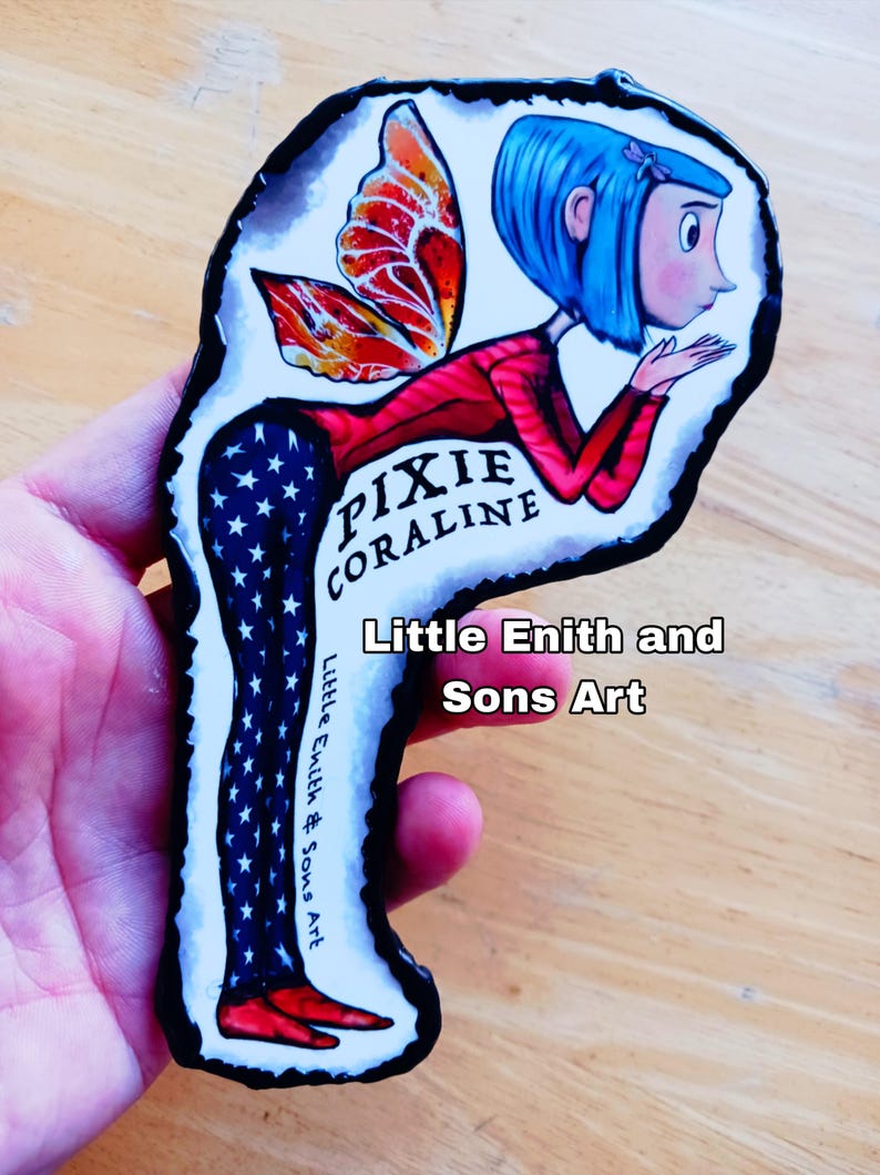 May include: A colorful illustration of a character named "Pixie Coraline" with blue hair, red top, and star-patterned pants. The image includes the text "Little Enith and Sons Art".