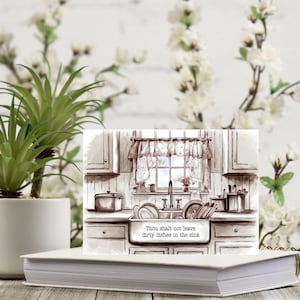 May include: A watercolor illustration of a kitchen sink with dirty dishes in it. The text "Thou shalt not leave dirty dishes in the sink" is written below the sink.