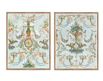May include: A set of two framed prints featuring a vintage floral pattern with a blue, green, and pink color scheme. The prints are framed in a light wood frame.