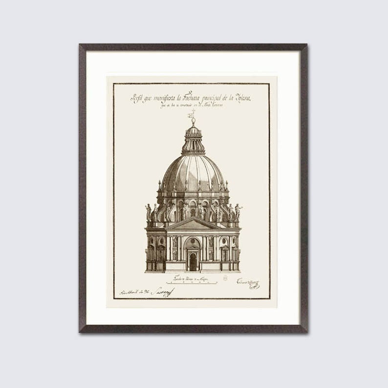 May include: Sepia-toned architectural print in a dark brown frame, depicting a domed building with detailed illustrations. The print includes text at the top and is set within a white mount. A classic piece of art for home decor, suitable for any room.