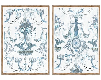 May include: Two framed prints with a blue and white floral pattern. The prints feature a vintage style design with a distressed look.