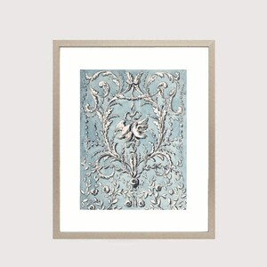 May include: A framed print of a vintage blue and white floral design with a pair of birds in the centre.