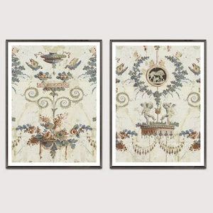 May include: Two framed prints with a vintage, faded look. Each print features a different design with a central motif of a vase with floral accents. The vase in the left print is topped with a bowl and birds. The vase in the right print is topped with two cherubs and a circular design with a horse inside.