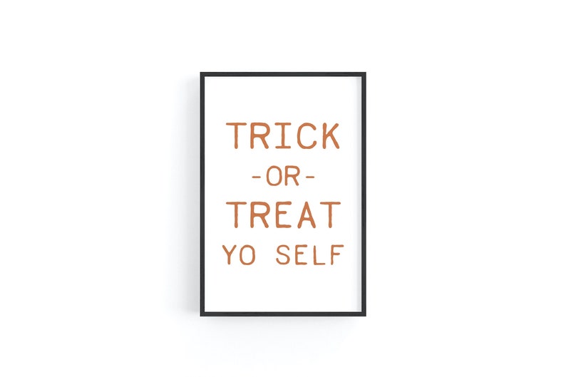 May include: A black framed print with the text "TRICK -OR- TREAT YO SELF" in orange.