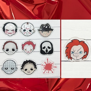 May include: A set of ten horror movie character stickers featuring iconic characters like Jason Voorhees, Freddy Krueger, and Chucky. The stickers are round and feature colorful illustrations of the characters' faces.