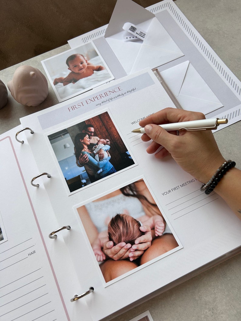 Inside pages of a handmade baby memory book designed to capture milestones and photo memories. Each page features dedicated spaces for firsts like smiles, steps, birthdays, and family moments. With its soft, minimal layout, parents can easily add, remove, or rearrange pages as their baby grows. Thoughtfully designed with photo areas and prompts for notes, this keepsake helps preserve every special moment from birth through the early years in a beautifully organized way.