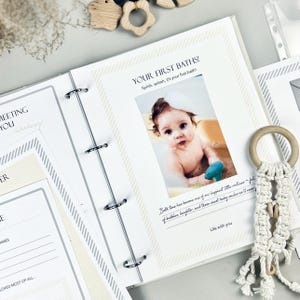 Inside pages of a handmade baby memory book binder created for capturing milestones and photo memories. Each page includes space for firsts like smiles, steps, birthdays, and family moments. The soft, minimal design allows parents to easily add, remove, and rearrange pages as their baby grows. Designed with photo areas and prompts for notes, this keepsake binder helps preserve every special moment from birth through the early years in a beautiful, organized way.