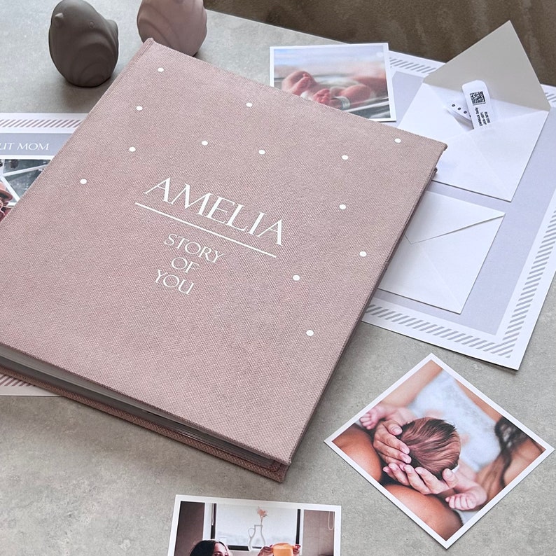 A handmade Dusty Pink color Baby Memory Binder with elegant White lettering on the cover. A beautifully designed keepsake to document your little one’s journey from birth to five years. Inside, you’ll find customizable pages for milestones, firsts, family memories, and photos — with space for notes and keepsakes too. Refillable and thoughtfully crafted, this baby binder helps parents cherish and organize memories — a timeless, heartfelt gift and family treasure.