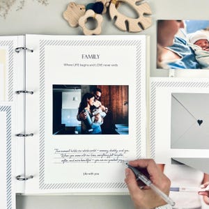 Inside pages of a handmade baby memory book binder created for capturing milestones and photo memories. Each page includes space for firsts like smiles, steps, birthdays, and family moments. The soft, minimal design allows parents to easily add, remove, and rearrange pages as their baby grows. Designed with photo areas and prompts for notes, this keepsake binder helps preserve every special moment from birth through the early years in a beautiful, organized way.