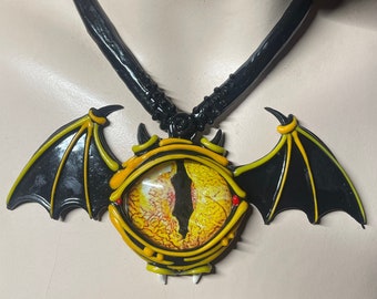 Gold Eyeball w/ Black wings Latex Necklace With Interchangeable Eye Devil Monster Toon