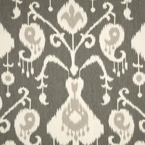 May include: Grey and white fabric with an ikat pattern. The pattern features a repeating design of stylised flowers and leaves.