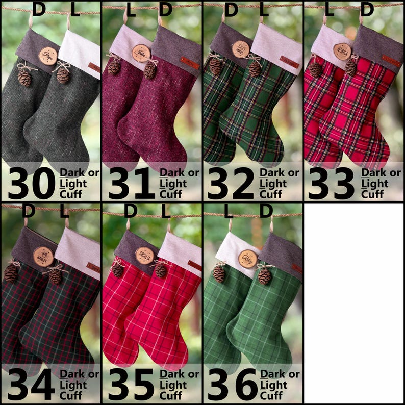 May include: A collection of seven pairs of Christmas stockings, each featuring a wooden name tag and a small pinecone accent. The stockings come in various textures and patterns, including solid gray, maroon, green plaid, and red plaid designs.