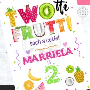 May include: A colorful birthday card with a fruit theme. The card says "Two-tti Fru-tti" and "such a cutie!" with the name "Marriela" and the number "2" in a bright green font. The card is decorated with various fruits, including watermelon, pineapple, kiwi, banana, and orange.