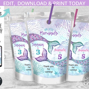 Pode incluir: Três etiquetas de caixa de suco imprimíveis com uma cauda de sereia com escamas roxas e verdes, coral e o texto "Our Little Mermaids". Os rótulos são projetados para uma festa de aniversário e incluem o nome "Jessica" e a idade "3" em dois dos rótulos e o nome "Amanda" e a idade "5" no outro rótulo.