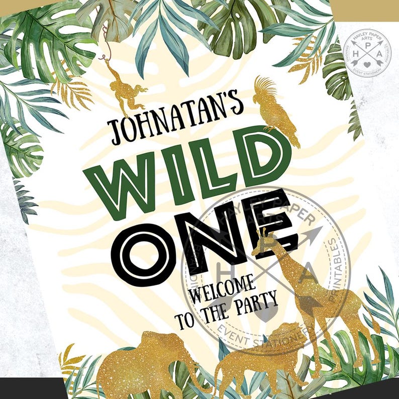 May include: A printable party sign with a jungle theme. The sign says "Johnatan's Wild One" with a green and black font. The background is a white and gold zebra print. There are gold glitter animals, including a giraffe, lion, and elephant.