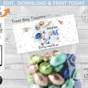 May include: A printable treat bag topper featuring a cartoon astronaut holding balloons with planets. The text reads "Michael is One" and "First trip around the sun". The topper is 4.25 inches by 4 inches.