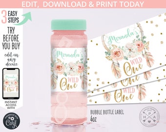 May include: A pink bubble bottle with a mint green cap and a label featuring floral and feather designs. The label reads "Miranda's WILD One" in gold lettering. The image also includes text that says "EDIT, DOWNLOAD & PRINT TODAY".