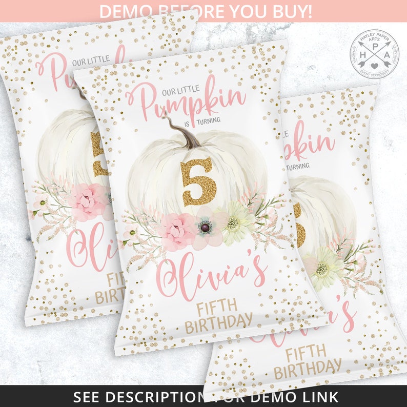 May include: White party favor bags with a pumpkin theme. The bags feature a white pumpkin with a gold glitter number 5, pink floral accents, and the text "Our Little Pumpkin is Turning" and "Olivia's Fifth Birthday". Gold confetti dots the background.