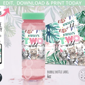 May include: A pink and green bubble bottle label with a jungle theme. The label features a giraffe, zebra, lion, elephant, and rhino. The text on the label reads "Harley's Two Wild". The label is for a 40 oz bubble bottle.