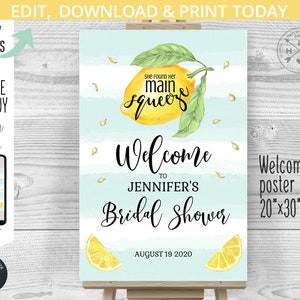 May include: A welcome sign for a bridal shower with a lemon theme. The sign is light blue with white stripes and features a watercolor illustration of a lemon with the text "She found her main squeeze". The text "Welcome to Jennifer's Bridal Shower" is in black lettering and the date "August 19, 2020" is below. The sign is 20 inches by 30 inches.