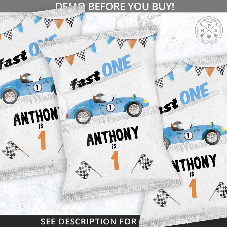 May include: Three blue and white chip bags with a racing car theme. The bags have a blue car with a chequered flag and the text "Fast One" and "Anthony is 1".