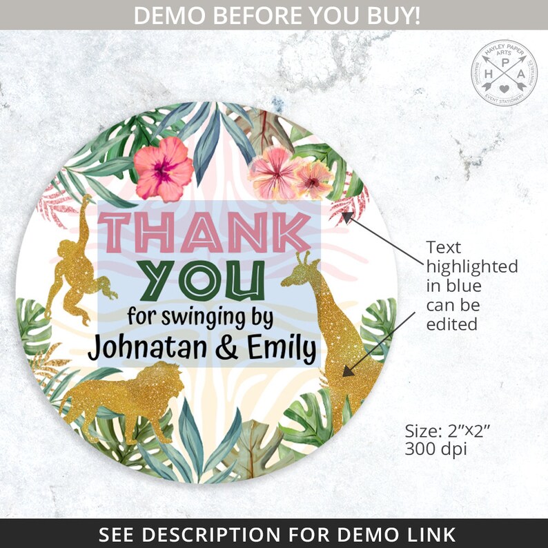 May include: Round thank you sticker with a jungle theme. The sticker features a pink and green "Thank You" with gold glitter accents. The text "for swinging by Johnatan & Emily" is also included. The sticker is surrounded by green leaves, pink flowers, and gold glitter animal silhouettes.