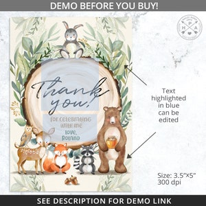 May include: A woodland-themed thank you card with a woodgrain background and a circle containing the text "Thank you!" in a handwritten font. The card features a variety of woodland animals, including a deer, a fox, a raccoon, a bear, and an owl. The text "for celebrating with me Love, Roland" is also included on the card.