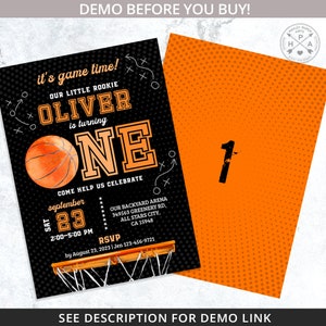 May include: A black and orange basketball-themed birthday invitation for a boy turning one. The invitation features a basketball with an orange and brown watercolor design, a basketball hoop, and the text "It's game time! Our little rookie Oliver is turning one. Come help us celebrate September 23, 2:00-5:00 PM. Our backyard arena 349563 Greenery Rd, All Stars City, CA 15948. RSVP by August 23, 2023 | Jen 123-456-9721."