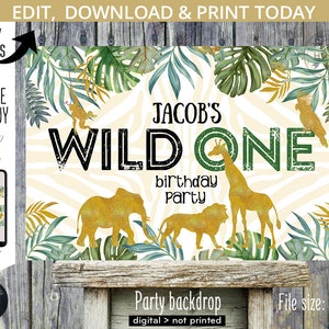May include: A digital party backdrop with a jungle theme. The design features the text "JACOB'S WILD ONE birthday party" with gold animal silhouettes, including an elephant, lion, and giraffe. The backdrop is 36" x 24" and includes the text "EDIT, DOWNLOAD & PRINT TODAY".