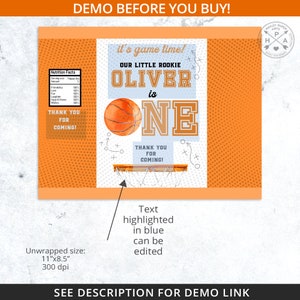 Peut inclure: Invitation de f&ecirc;te sur le th&egrave;me du basket-ball orange avec le texte "it's game time!" et "Our Little Rookie Oliver is ONE." Comprend un graphique de ballon de basket et une illustration de panier de basket. Dimensions : 27,94 cm x 21,59 cm.