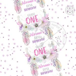 May include: A printable party design featuring a pink and white floral wreath with feathers and the text "Adriana's first birthday" and "Little One".