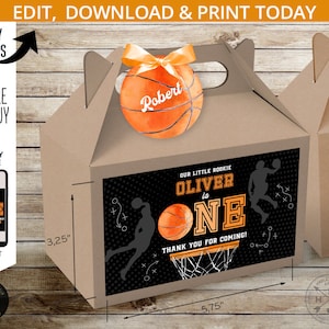 May include: A brown favor box with a black and orange basketball theme. The box is 5.75 inches wide and 3.25 inches tall. The box has a basketball with the name "Oliver" on it and the text "Our little rookie Oliver is one. Thank you for coming!"