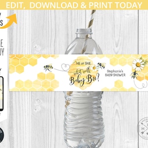 May include: A printable water bottle label with a yellow honeycomb pattern and a bee design. The text on the label reads "He or She what will Baby Bee?" and "Stephanie's Baby Shower".