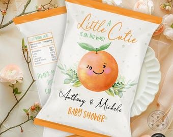 Könnte beinhalten: Orangefarbener Babyparty-Geschenkbeutel mit einer niedlichen Cartoon-Orange und dem Text "A Little Cutie is on the way!"  Anthony & Michele Baby Shower.