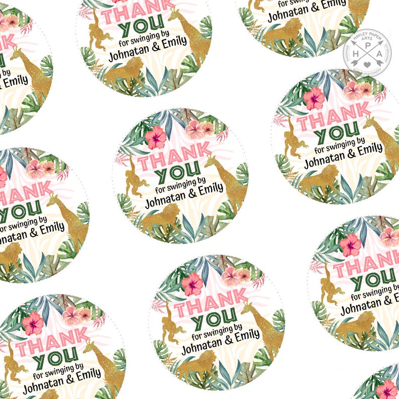 May include: Pink and green thank you stickers with gold glitter accents. The stickers feature a jungle theme with giraffes, monkeys, and tropical leaves. The text on the stickers reads "Thank You for swinging by Johnatan & Emily".