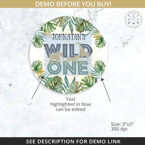 May include: A round, white sticker with a jungle theme. It features a green and gold leafy design with a giraffe, elephants, and the text "Johnatan's Wild One" in blue and gold.